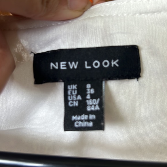 Half sleeve white blouse with floral detail - Picture 2 of 3